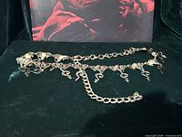 Full belt showing elephant links, hook clasp and chain extender