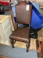 Full view of chair front showing upholstery and overall design
