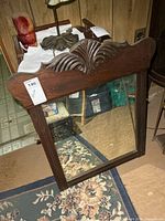 Full view of mirror standing on floor