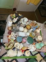 Top view showing full assortment of figurines, eggs, vases and decorative pieces