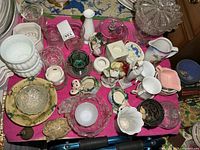 Overview of mixed glassware, planters, figurines, teacups