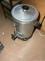 Full view of aluminum coffee urn with lid, handles and spigot