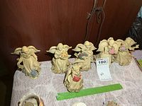 Group shot of all six Sarah’s Angels figurines on table