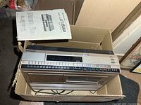 VCR in box with manual visible