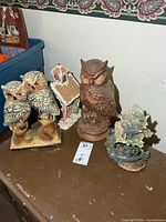 Group view of all four decorative figures