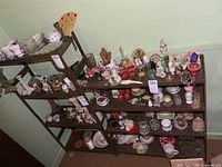 Both shelving units filled with ornaments, showing tier structure and color