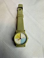 Front view showing entire watch with strap