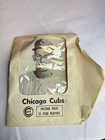 Front of envelope showing Chicago Cubs branding and window with player photo visible
