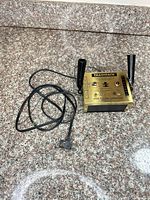Transformer with cord coiled, perspective view