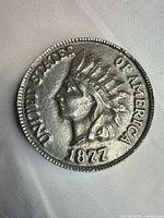 Full view of front of oversized replica coin