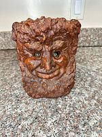 Front view showing Green Man face and finish wear