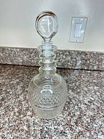 Full view of decanter showing diamond pattern and stopper