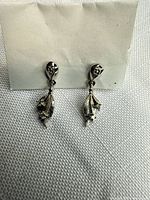 front view of both earrings showing design and stones