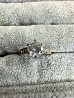 Top view showing centre stone, accent stones and overall design