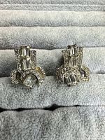 front view of both earrings showing overall design and stones
