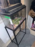 Full view of aquarium on stand showing overall condition and components