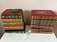 Entire lot: two stacks showing all books, dictionary on top