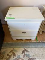 Front view showing entire nightstand, drawers and base