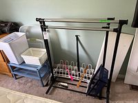 Garment rack, blue shelf, white tote and basket in situ