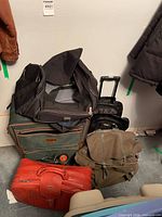 Stacked luggage showing all six items