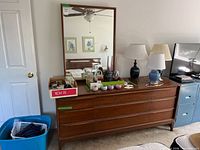 Front view of dresser with attached mirror and six drawers