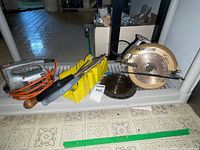 Overall lot showing circular saw, jigsaw, miter box, hand tools and blades