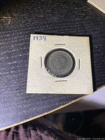 Obverse side of 1939 Canada 5 ¢ coin in 2×2 flip