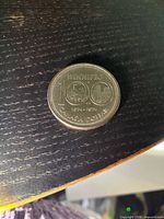 Reverse of coin showing 100 Winnipeg design