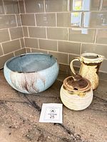 Group shot of bowl, creamer and sugar pot