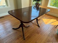 Dining table with both leaves installed