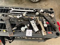 Overview of all hitch mounts, balls and wrenches on work cart