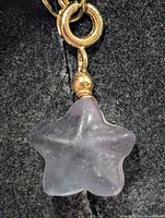 Close-up of fluorite star pendant front view