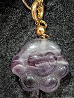 front view of fluorite pendant showing heart motif and lobes