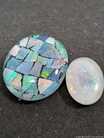 Mosaic opal cabochon and white opal cabochon front view