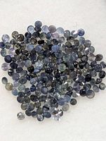 Pile of small round faceted sapphires