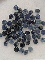 Top view of loose round sapphires spread out