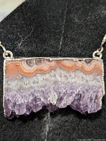 Front close-up of agate druzy pendant