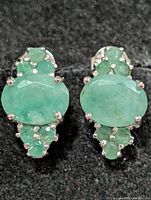 front view of both emerald earrings