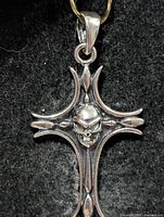 front view silver skull cross pendant with bail
