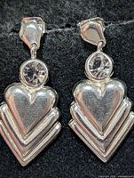 Front view of both earrings showing stones and heart drops