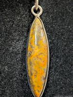front view of marquise bumble bee jasper pendant