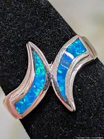 front view of silver ring with blue opalite inlay