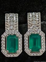front view showing onyx stones, CZ halo and pavé section