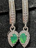 Front view showing green onyx drops and CZ halos