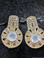 Front view of both earrings showing moonstones and CZ halo