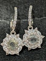 Front view of both earrings showing gemstones and overall design