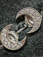 Front view of both crescent earrings showing pavé CZ stones