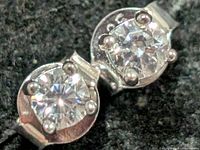 close-up of the two cubic zirconia stones in silver settings