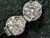 Front close-up of both cubic zirconia stones in prong settings