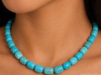 Necklace worn on model displaying bead color and fit